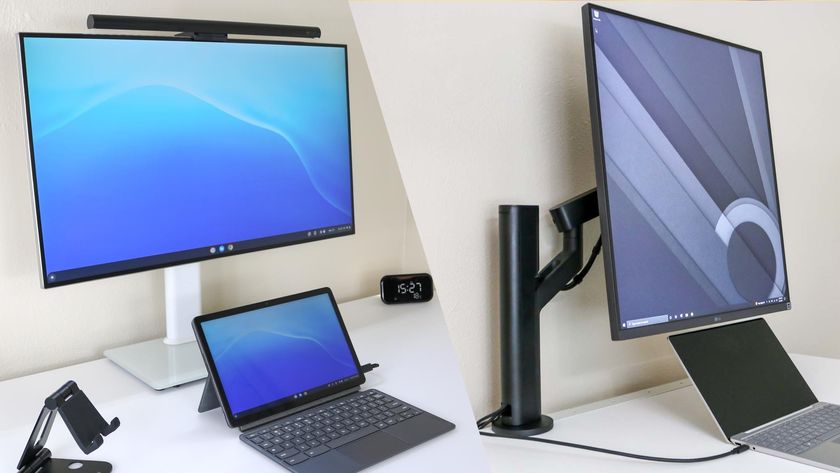 Two desk setups side by side where one is using a monitor stand and the other is using a monitor arm