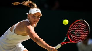 Elena Rybakina of Kazakhstan plays a backhand in the Women's Singles Final Match against Ons Jabeur of Tunisia during day thirteen of The Championships Wimbledon 2022 at All England Lawn Tennis and Croquet Club on July 09, 2022 in London, England.