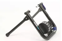 Wahoo KICKR SNAP Smart Turbo Trainer in this image is folded out and side on
