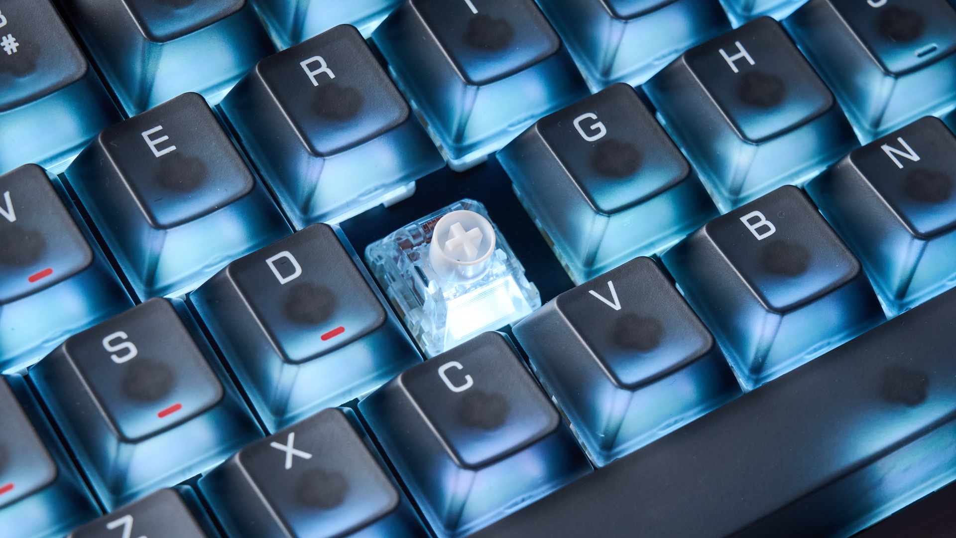 The Lofree Hyzen keyboard on a stone surface
