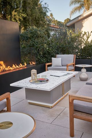 backyard with fire pit screen by Kathy Taslitz