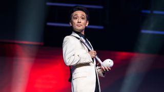 Masayoshi Soken performing live with an otamatone instrument.