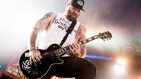 Every Time I Die guitarist Andy Williams performs at Download Festival 2015