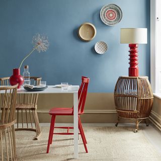 dining room with dining table and red accent dining chair