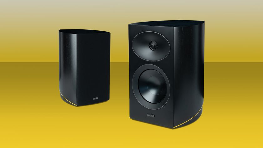 Arcam Radia R25 speakers on a yellow background
