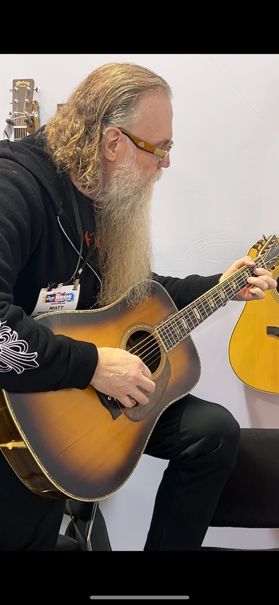 Matt Swanson holds and plays his 1938 Martin D-45 at the 2026 NAMM Show in Anaheim, California