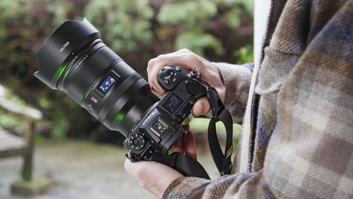 Viltrox AF 35mm F1.2 LAB Z lens for Nikon, attached to a Nikon Z6 II, in user's hands