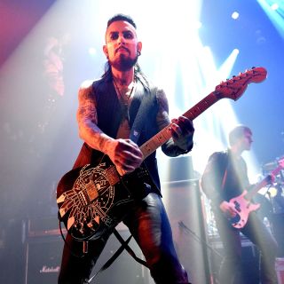 Dave Navarro performs live with a Fender Stratocaster