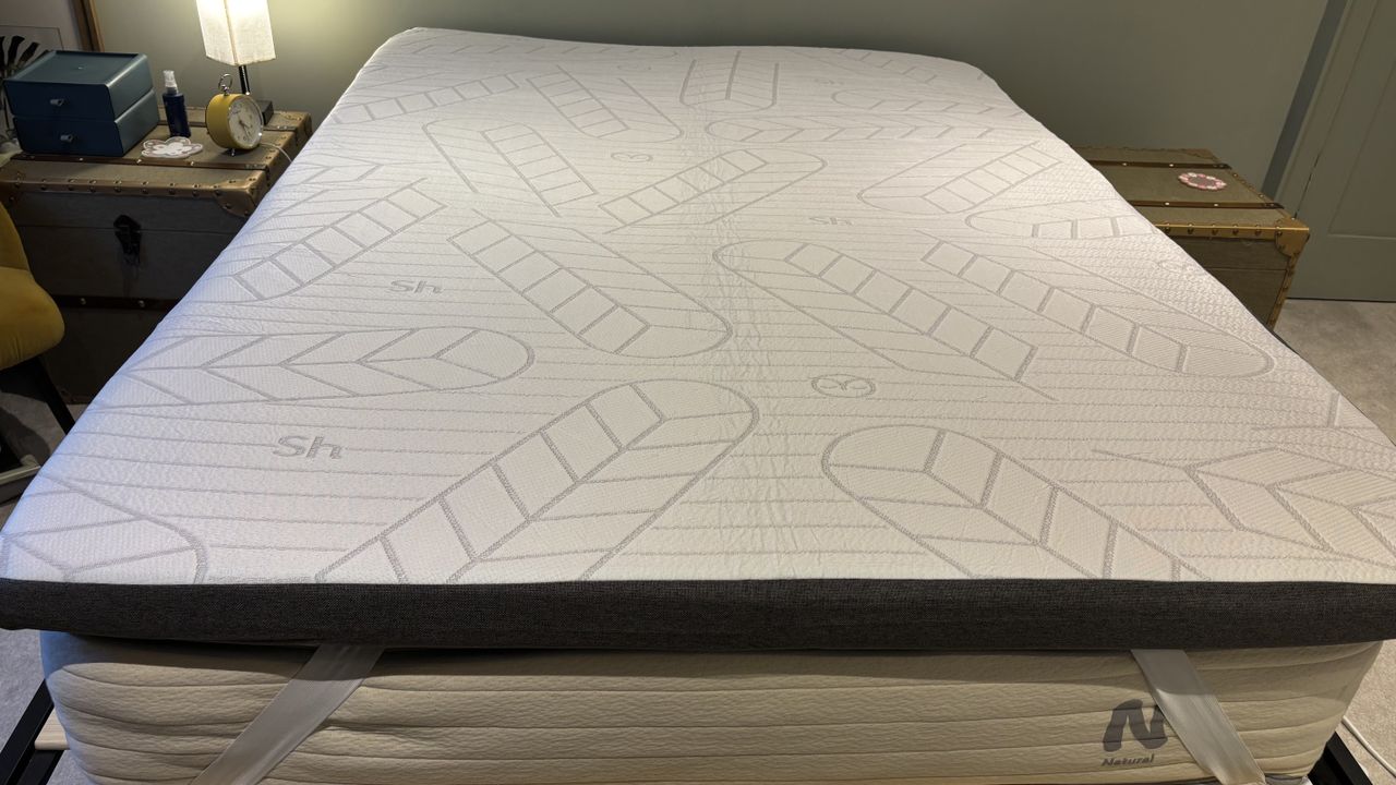 The Sleepyhead Cooling Copper Mattress Topper on a latex bed