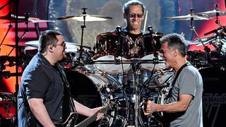 Bassist Wolfgang Van Halen, drummer Alex Van Halen and guitarist Eddie Van Halen of Van Halen perform during the 2015 Billboard Music Awards at MGM Grand Garden Arena on May 17, 2015 in Las Vegas, Nevada. 