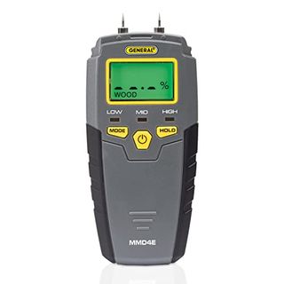 A gray handheld device with two spiky metal sensors on the top with a green LED screen and three sensor alerts for low medium and high humidity, along with a yellow mode, hold and power button