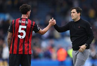 Andoni Iraola, Manager of AFC Bournemouth, shakes hands with Marcos Senesi of AFC Bournemouth after the Premier League match between Leeds United and Bournemouth at Elland Road on September 27, 2025 in Leeds, England.