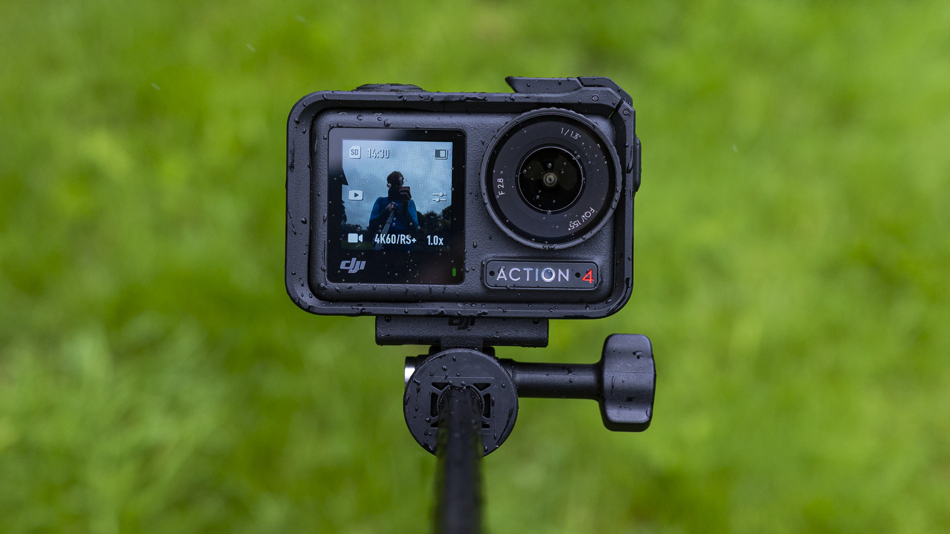 DJI Osmo Action 4 camera on the selfie stick accessory