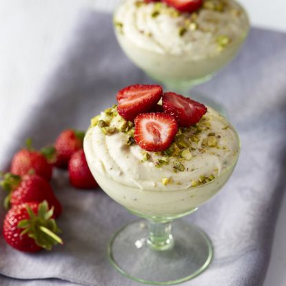 White chocolate and pistachio mousse with strawberries
