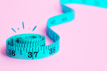a close up of a body tape measure which can show if you're skinny fat