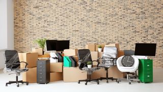 Boxes of furniture and office gadgets