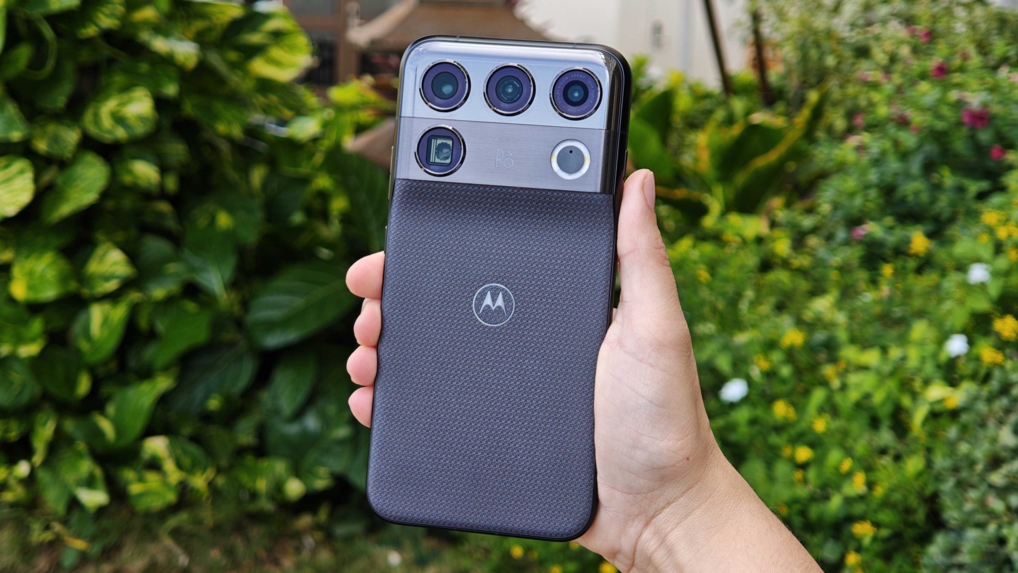 The Motorola Signature 27 in hand, outside