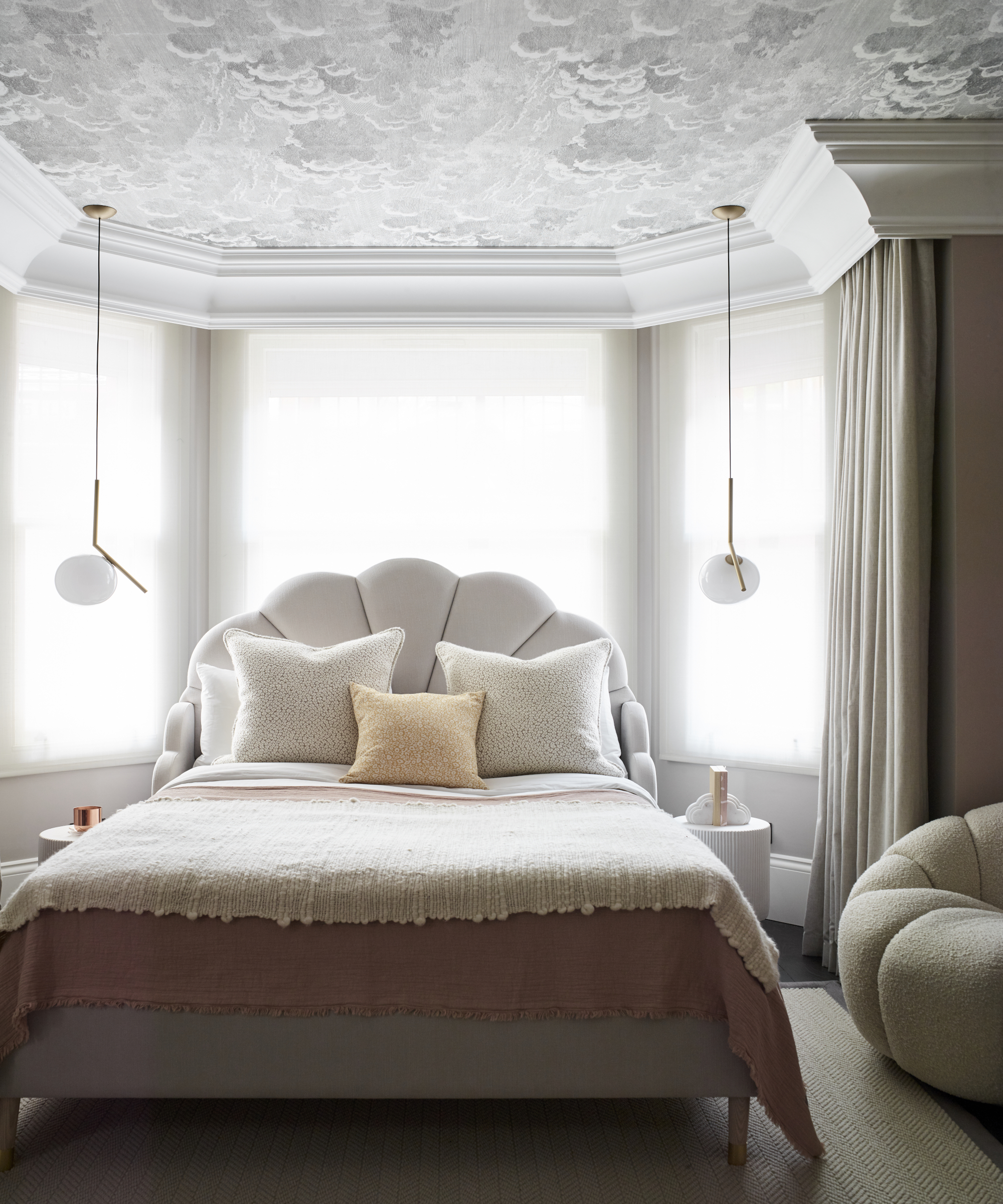 Modern house in a neutral, monochrome palette with pastel pink touches