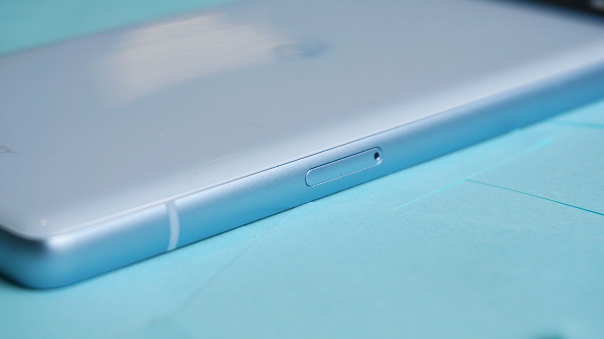 Google Pixel 7a review SIM slot sticky notes