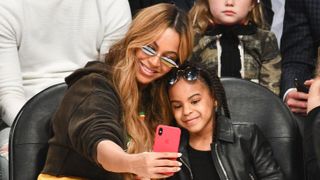 Beyonce and Blue Ivy sat courtside