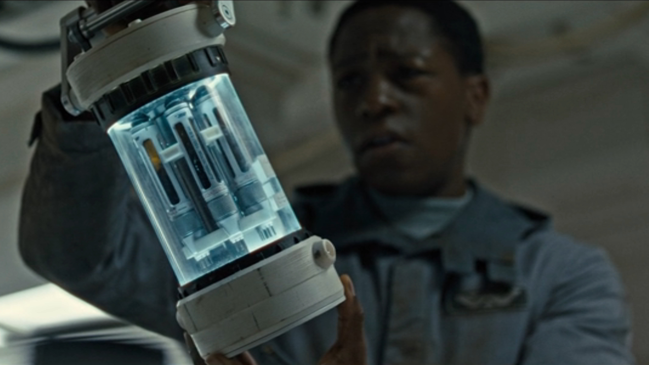 David Jonsson looks at a container of vials with Compound Z-01 in Alien: Romulus.