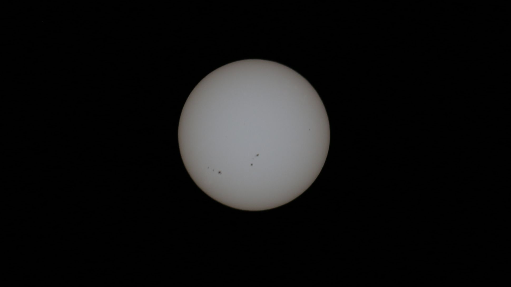 K&amp;amp;F Concept ND1000000 filter: At 1/50 sec, f/8, and ISO100, sunspots are visible, and the solar disk is bright.