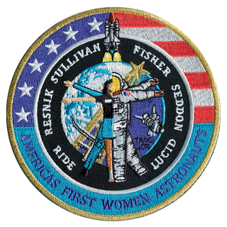 a mission patch showing a spacecraft above earth