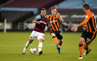Jack Wilshere, left, in action against Hull in his final appearance for West Ham