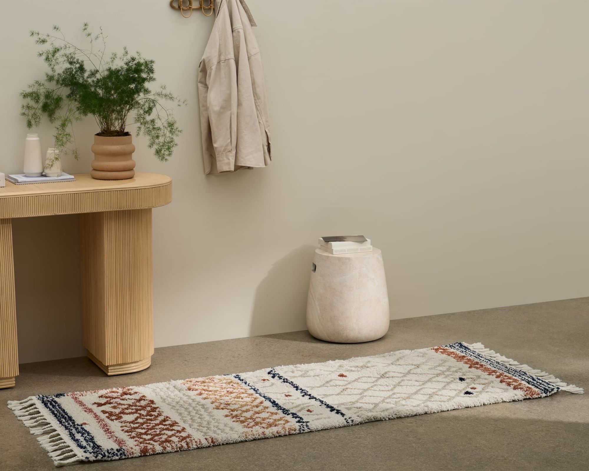 Made Berber style runner rug on the floor in neutral home