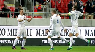 Slovakia’s Robert Mak (left) was on target against Scotland