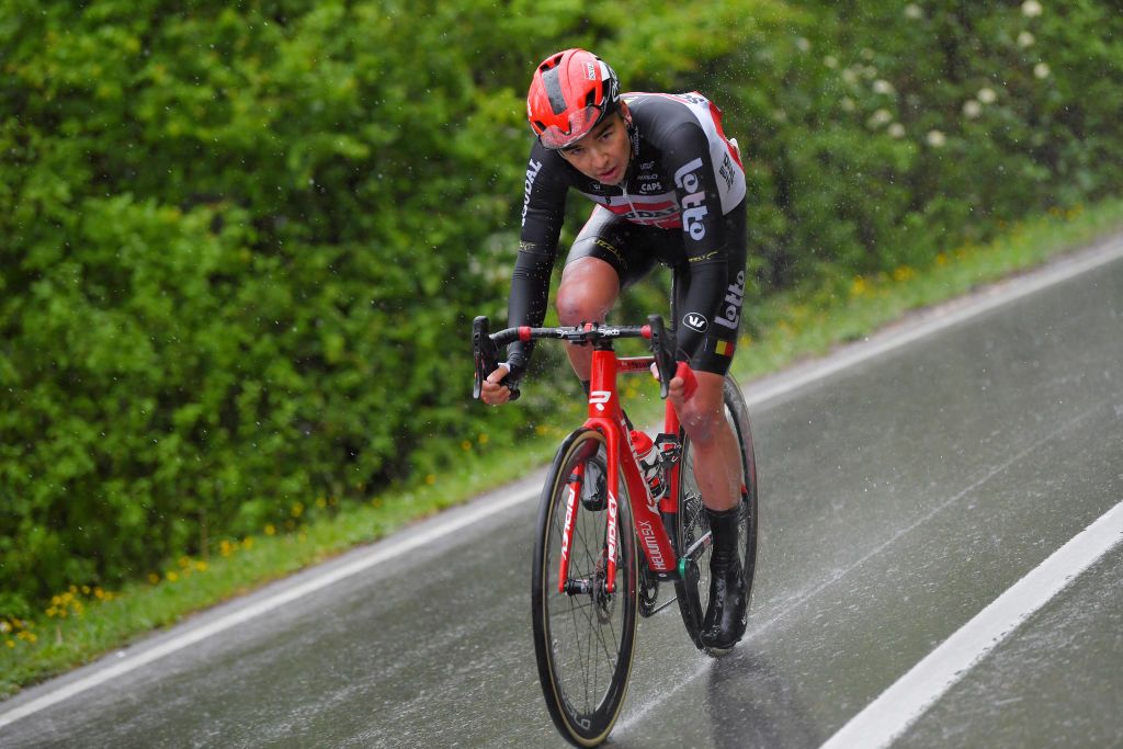 ESTAVAYER SWITZERLAND APRIL 30 Kobe Goossens of Belgium and Team Lotto Soudal attack on breakaway during the 74th Tour De Romandie 2021 Stage 3 a 1687km stage from Estavayer to Estavayer Rain TDR2021 TDRnonstop UCIworldtour on April 30 2021 in Estavayer Switzerland Photo by Luc ClaessenGetty Images