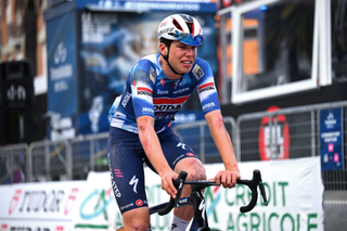 A battered and bruised Magnier crosses the line after crashing twice on the final stage of Tirreno-Adriatico