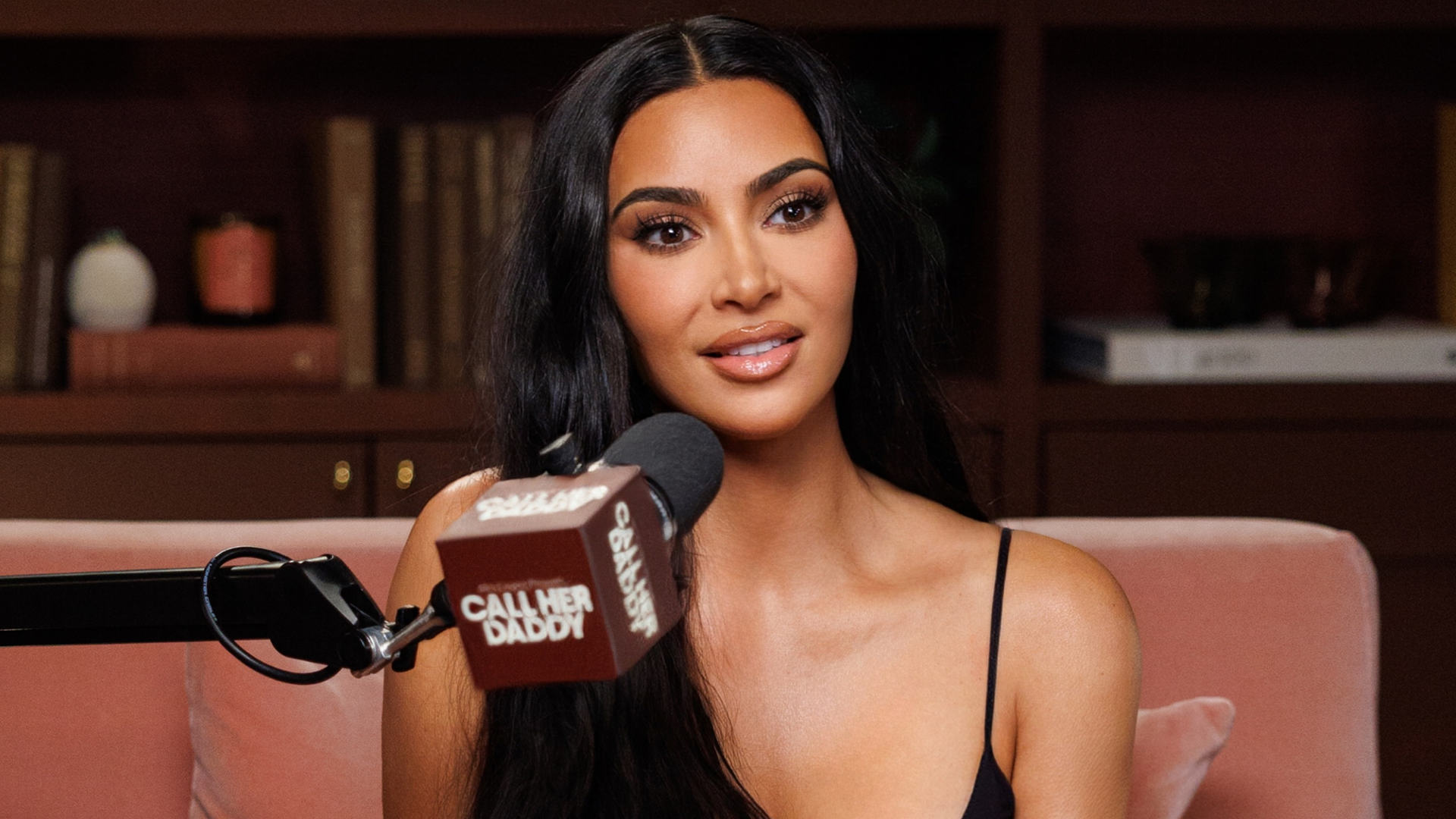Kim Kardashian appeared on Call Her Daddy in a black tank top and matching leggings