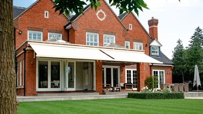 awning ideas: white awning over patio from Caribbean Blinds