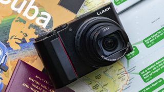 The Panasonic Lumix TZ200 camera sitting on travel guides