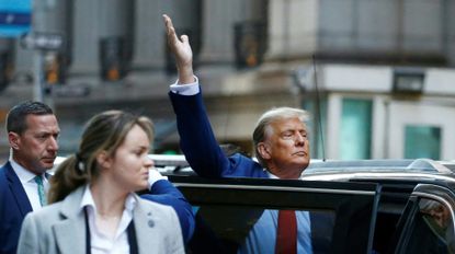 TOPSHOT - Former US President Donald Trump departs after speaking to the press after attending the civil fraud trial against the Trump Organization in New York State Supreme Court, in New York City on January 11, 2024. Donald Trump ignored warnings from the judge in his New York civil fraud trial Thursday and turned closing arguments into an election campaign attack, claiming that prosecutors are out to stop his political comeback. 