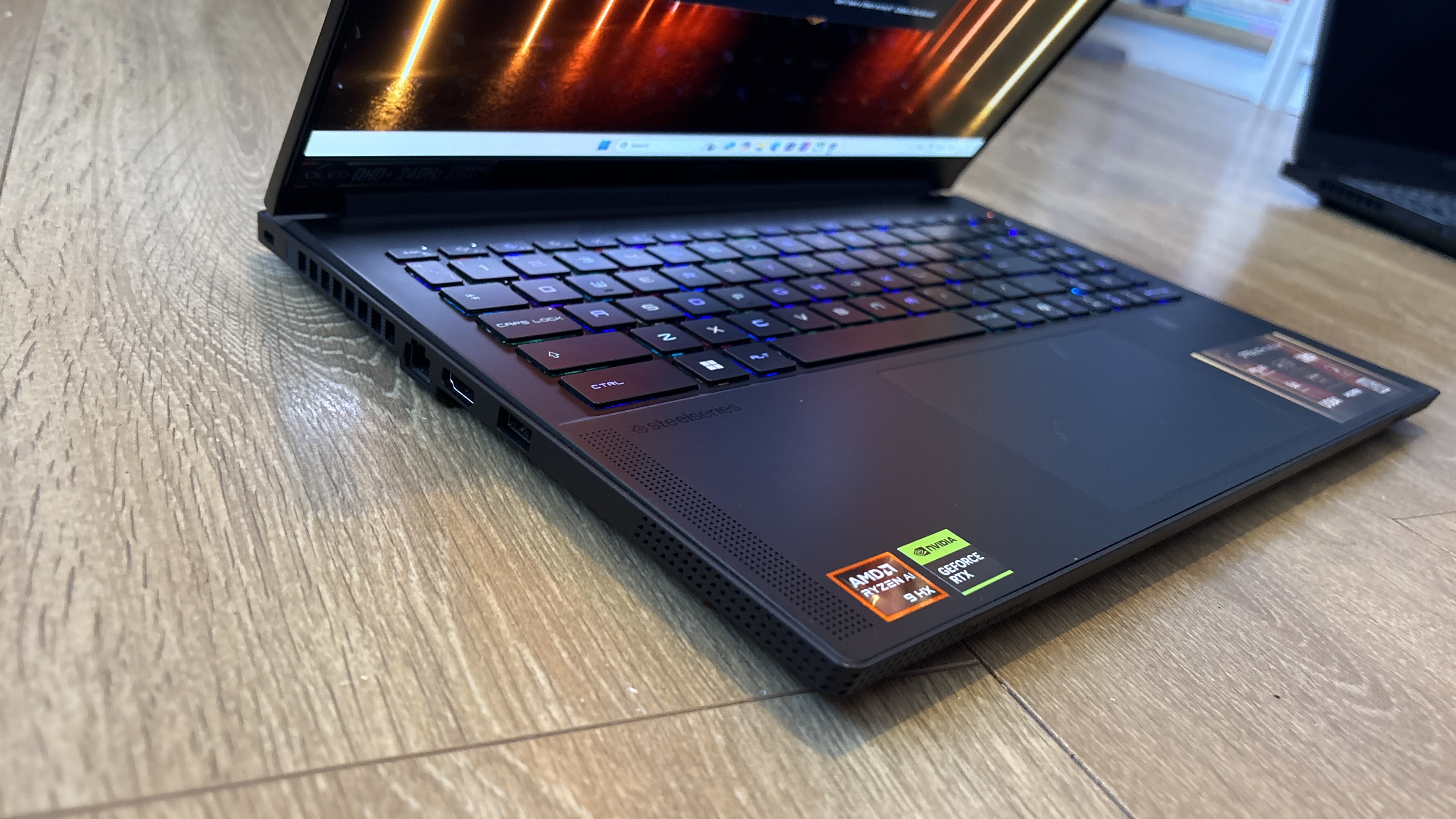 MSI Stealth A16 AI+ on wooden surface