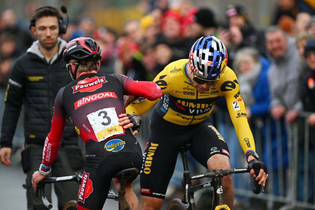 NAMUR BELGIUM DECEMBER 27 LR Eli Iserbyt of Belgium and Team Pauwels Sauzen Bingoal and Wout Van Aert of Belgium and Team JumboVisma congratulate each other during the 19th Superprestige HeusdenZolder 2023 Mens Elite on December 27 2023 in Namur Belgium Photo by Luc ClaessenGetty Images