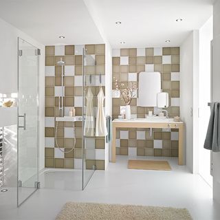 bathroom with checks tiles on wall and shower