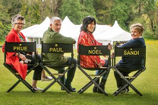 The judges in directors chairs with their names on the back