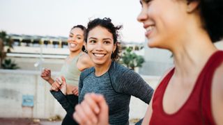 What does 30 minutes of running do? Image shows group of women running