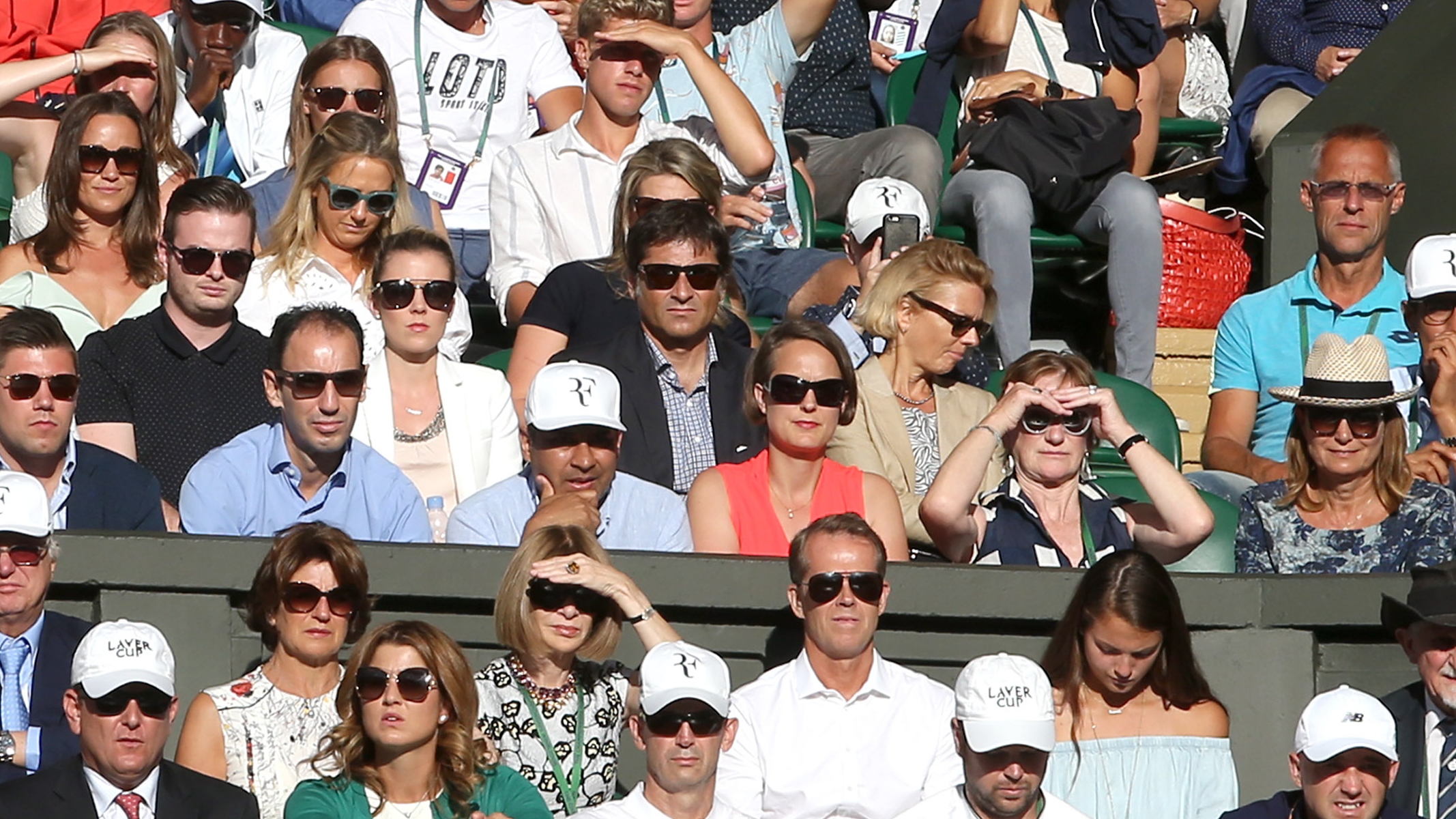 Pippa Middleton (L) and Carole Middleton (R) attend day seven of the Wimbledon Tennis Championships at the All England Lawn Tennis and Croquet Club on July 10, 2017