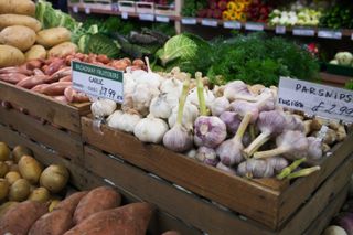 Garlic and other vegetables in a market