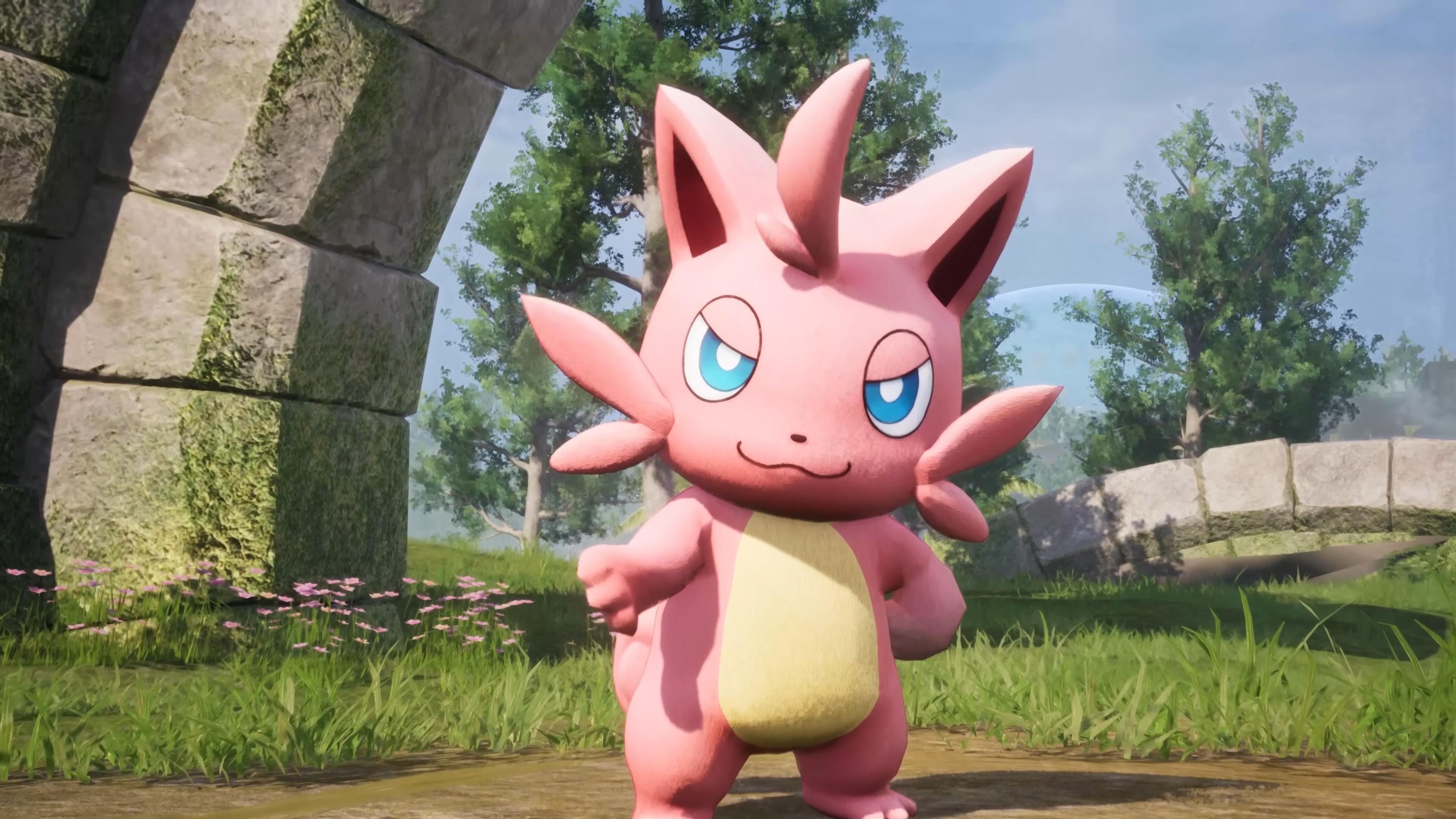 Palworld 1.0 launch trailer screenshot shows a cat-like Pal called Cattiva reaching out its paw.