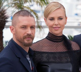 Charlize Theron and Tom Hardy at a photocall for Mad Max: Fury Road at the Cannes Film Festival premiere