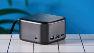Belkin Connect USB-C Dock 6-in-1 Core GaN, 130W on a white surface with a blue background