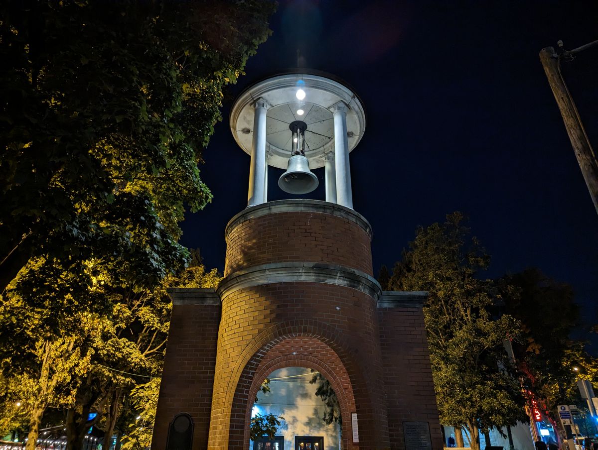 Pixel 7 nighttime wide shot of a bell tower