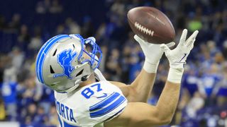 : Sam LaPorta #87 of the Detroit Lions warms up prior to the game against the Indianapolis Colts at Lucas Oil Stadium on November 24, 2024 in Indianapolis, Indiana.