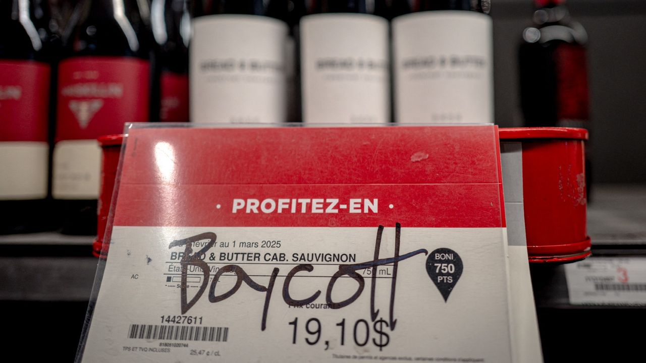 A graffiti scrawl urges consumers to boycott an American wine at an off-licence in Montreal