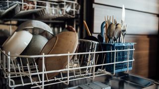 dishes and cutlery in a dishwasher